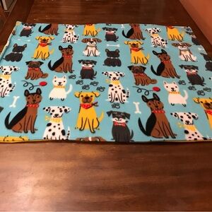Sky blue dogs and their buddies smiling on a soft warm blanket !